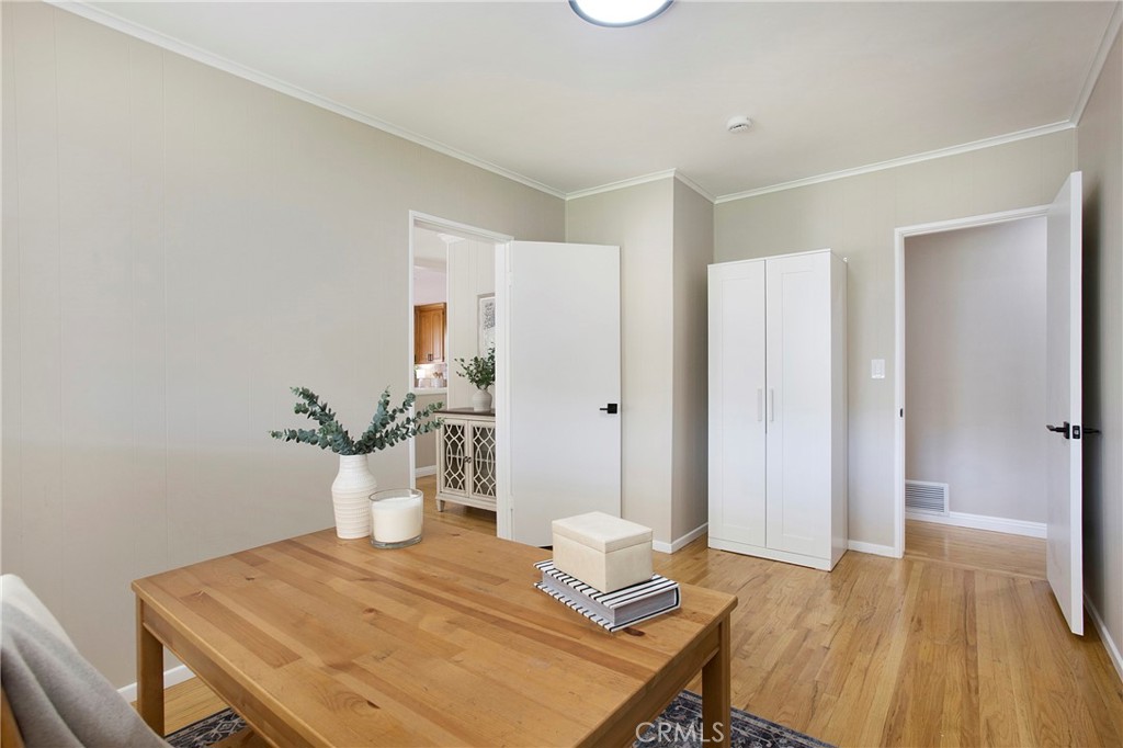 708 East Alder Street Brea, CA 92821 - Photo 16 of 34 a workspace with furniture and wooden floor