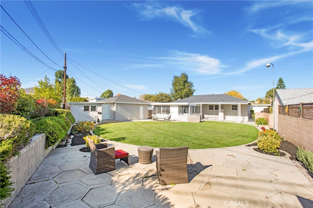 708 East Alder Street Brea, CA 92821 - Photo 25 of 34 a front view of a house with a garden