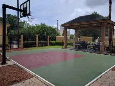 a view of a backyard of the house