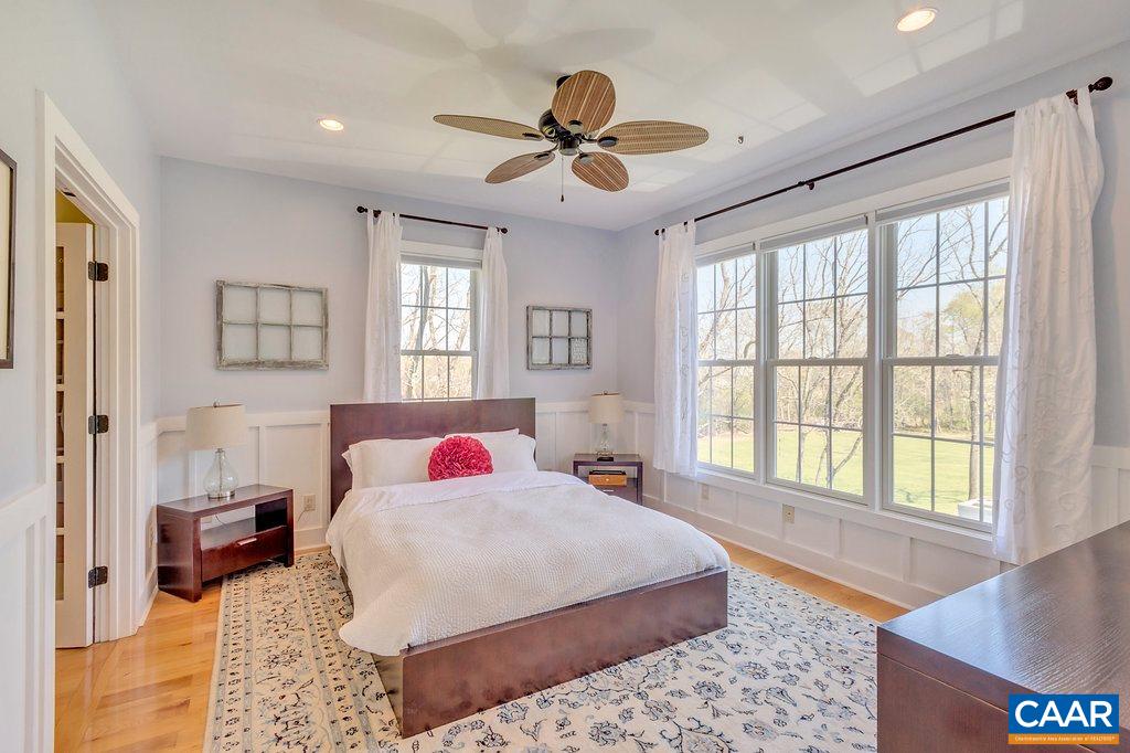 85 Fox Ridge Lane Ruckersville, VA 22968 - Photo 12 of 33 a bedroom with a bed and a large window