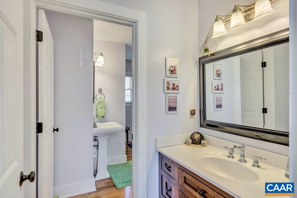 85 Fox Ridge Lane Ruckersville, VA 22968 - Photo 19 of 33 a bathroom with a sink and a mirror