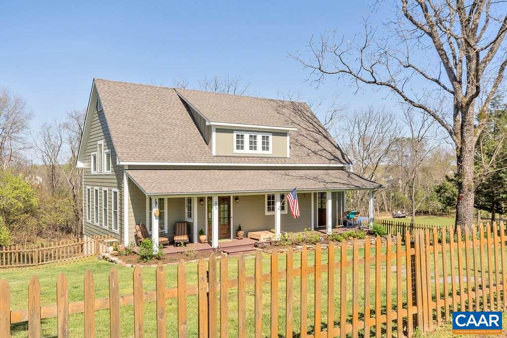 85 Fox Ridge Lane Ruckersville, VA 22968 - Photo 2 of 33 a view of a brick house with large windows