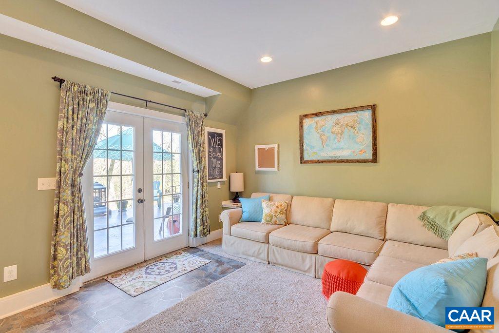 85 Fox Ridge Lane Ruckersville, VA 22968 - Photo 22 of 33 a living room with furniture and a large window