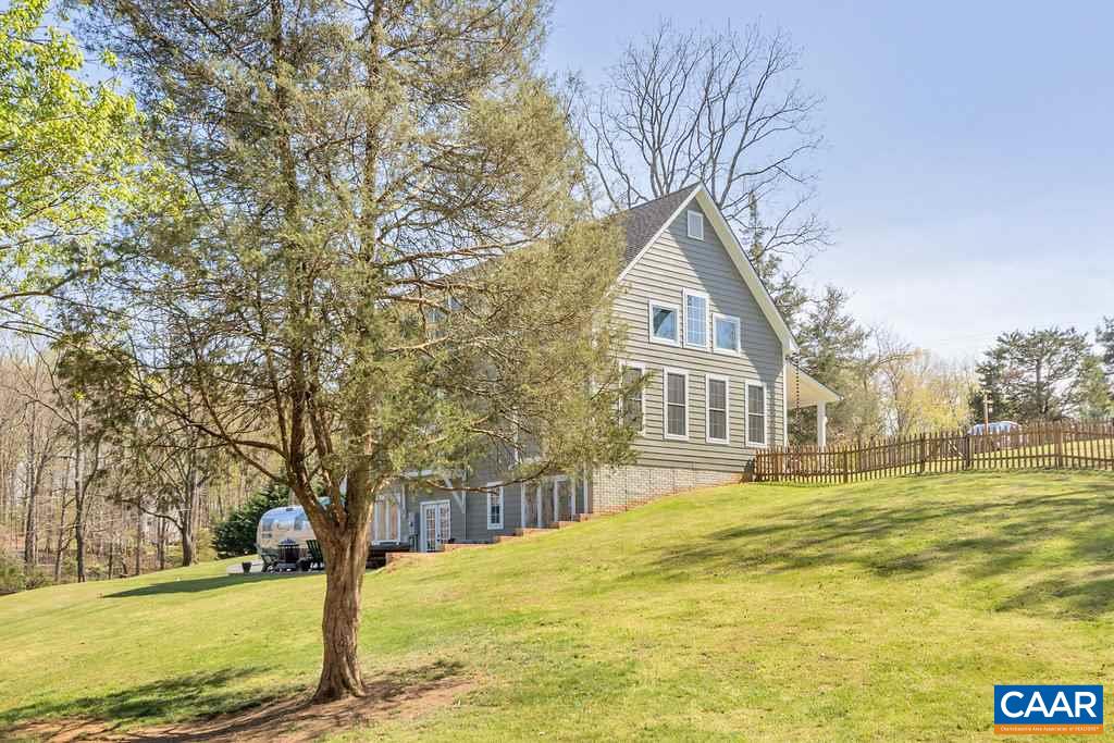 85 Fox Ridge Lane Ruckersville, VA 22968 - Photo 31 of 33 a front view of a house with a yard
