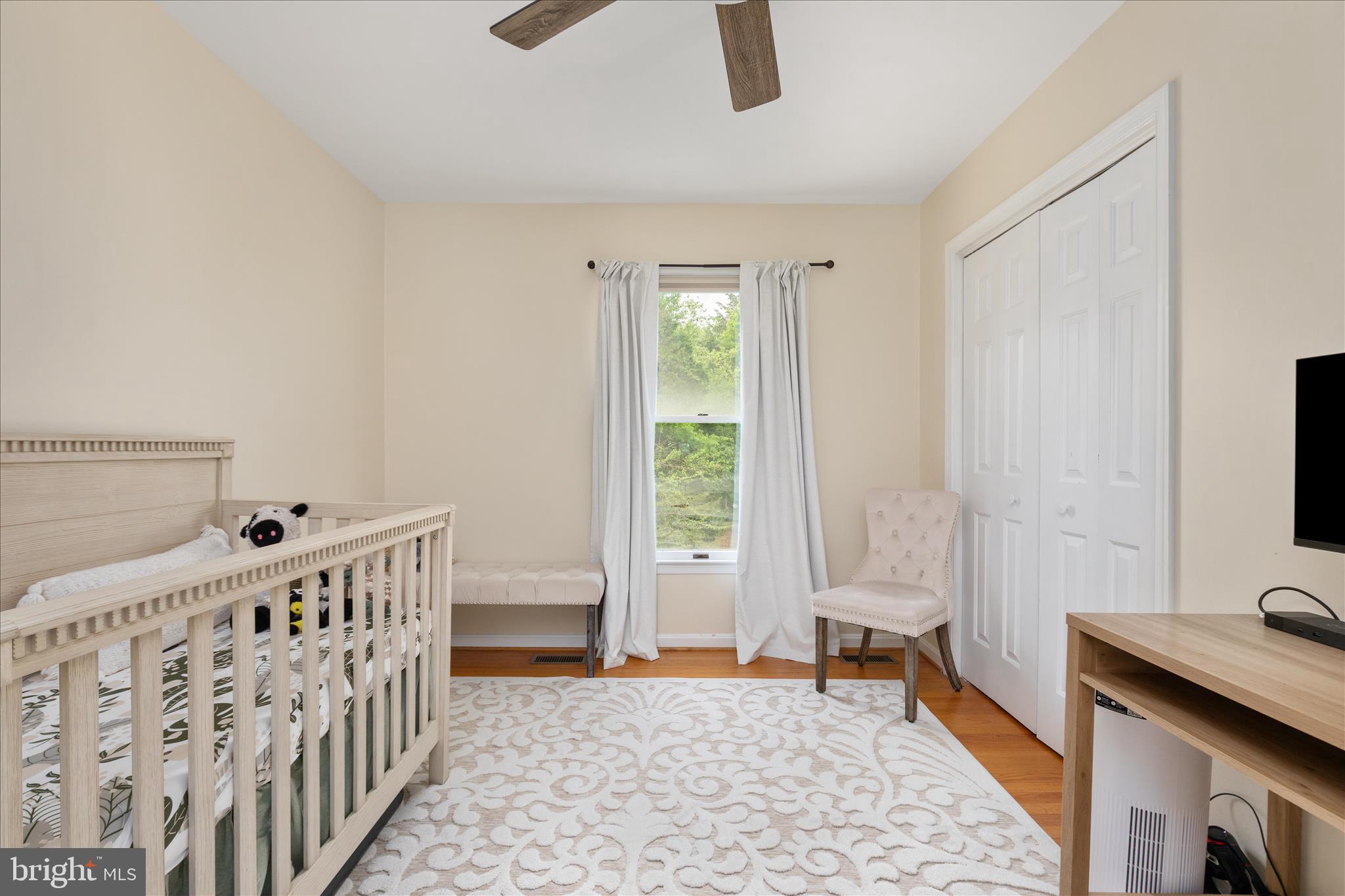 208 North Rappahannock Street Remington, VA 22734 - Photo 14 of 21 a bedroom with furniture and a window