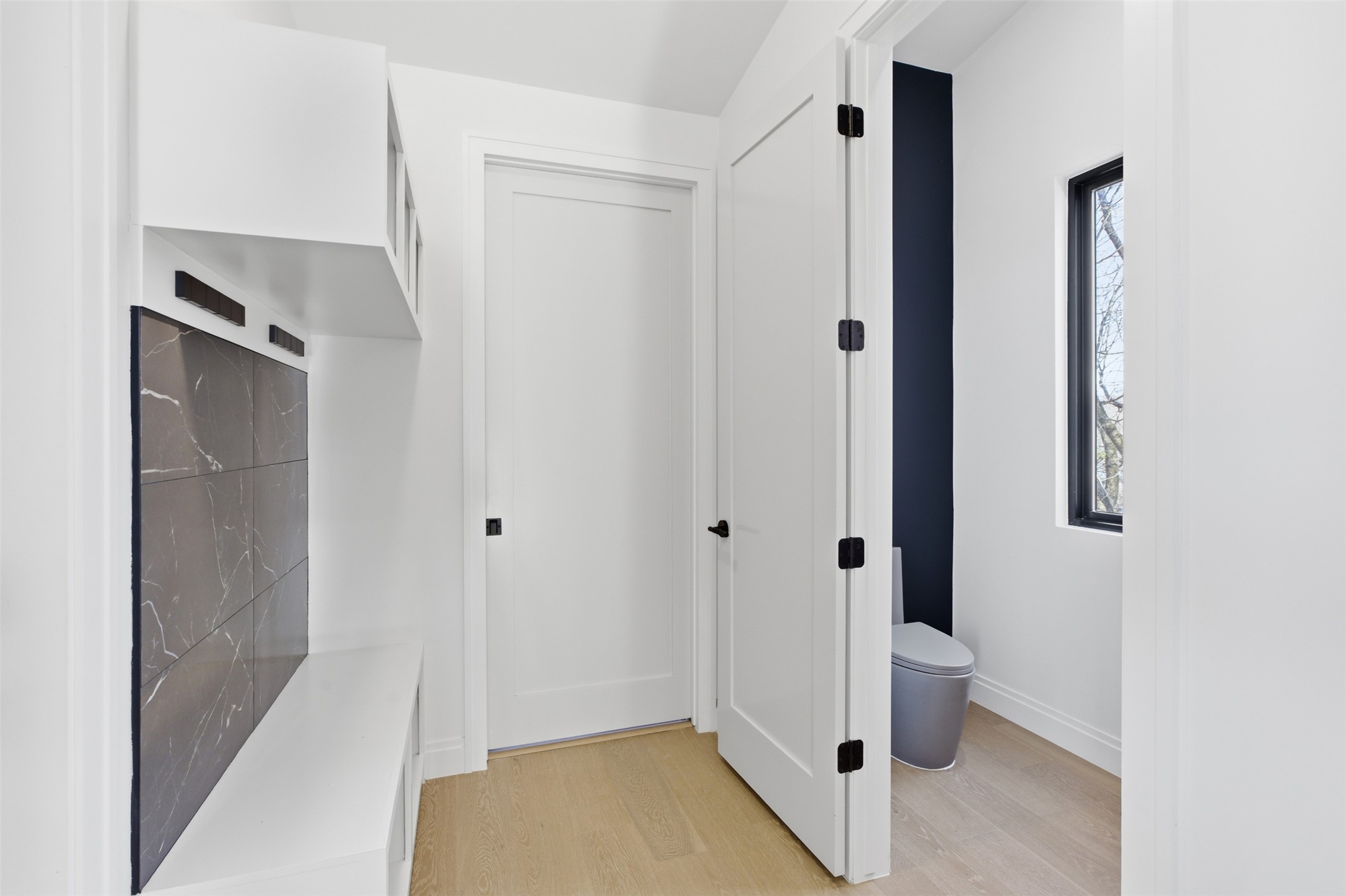 5013 Rob-Scott Street Austin, TX 78721 - Photo 15 of 35 Upstairs mudroom located across from half bathroom.