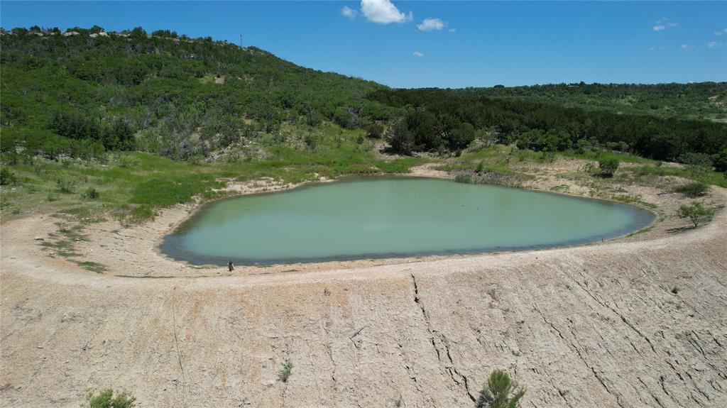 464 Upper Brad Road Strawn, TX 76475 - Photo 15 of 32 a view of a lake with a yard