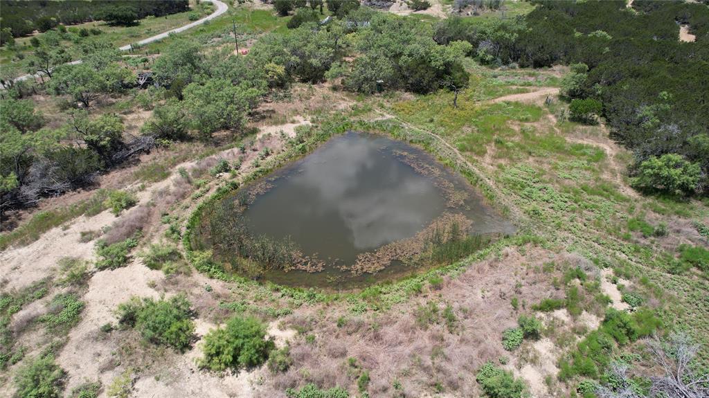 464 Upper Brad Road Strawn, TX 76475 - Photo 25 of 32 a view of a dry yard with green space