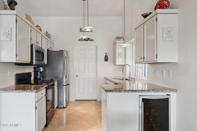 a view of a balcony with an outdoor seating