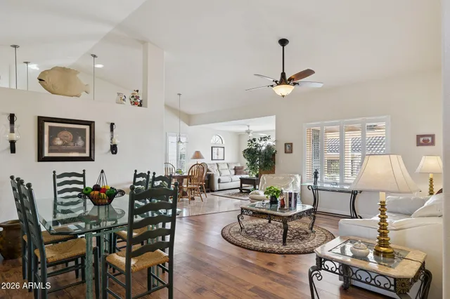a living room with furniture and window