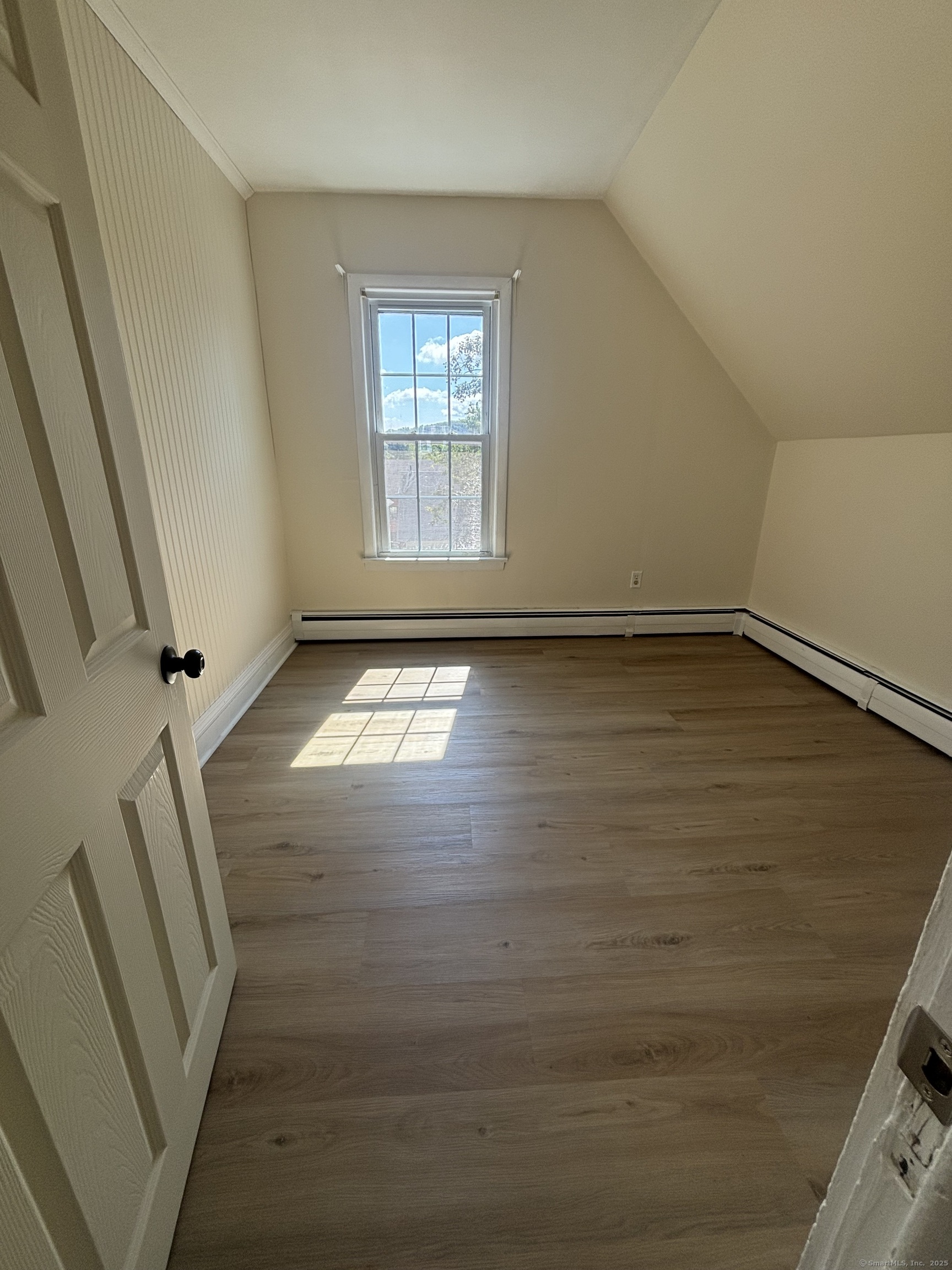 161 Cliff Street Norwich, CT 06360 - Photo 14 of 14 a view of an empty room with a window