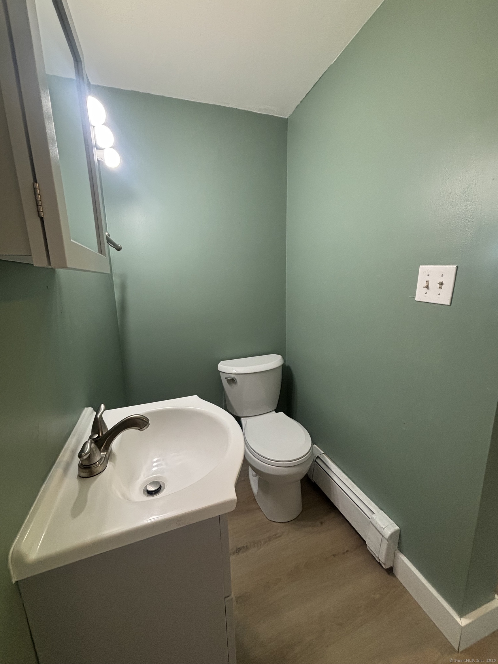 161 Cliff Street Norwich, CT 06360 - Photo 7 of 14 a bathroom with a sink and a toilet