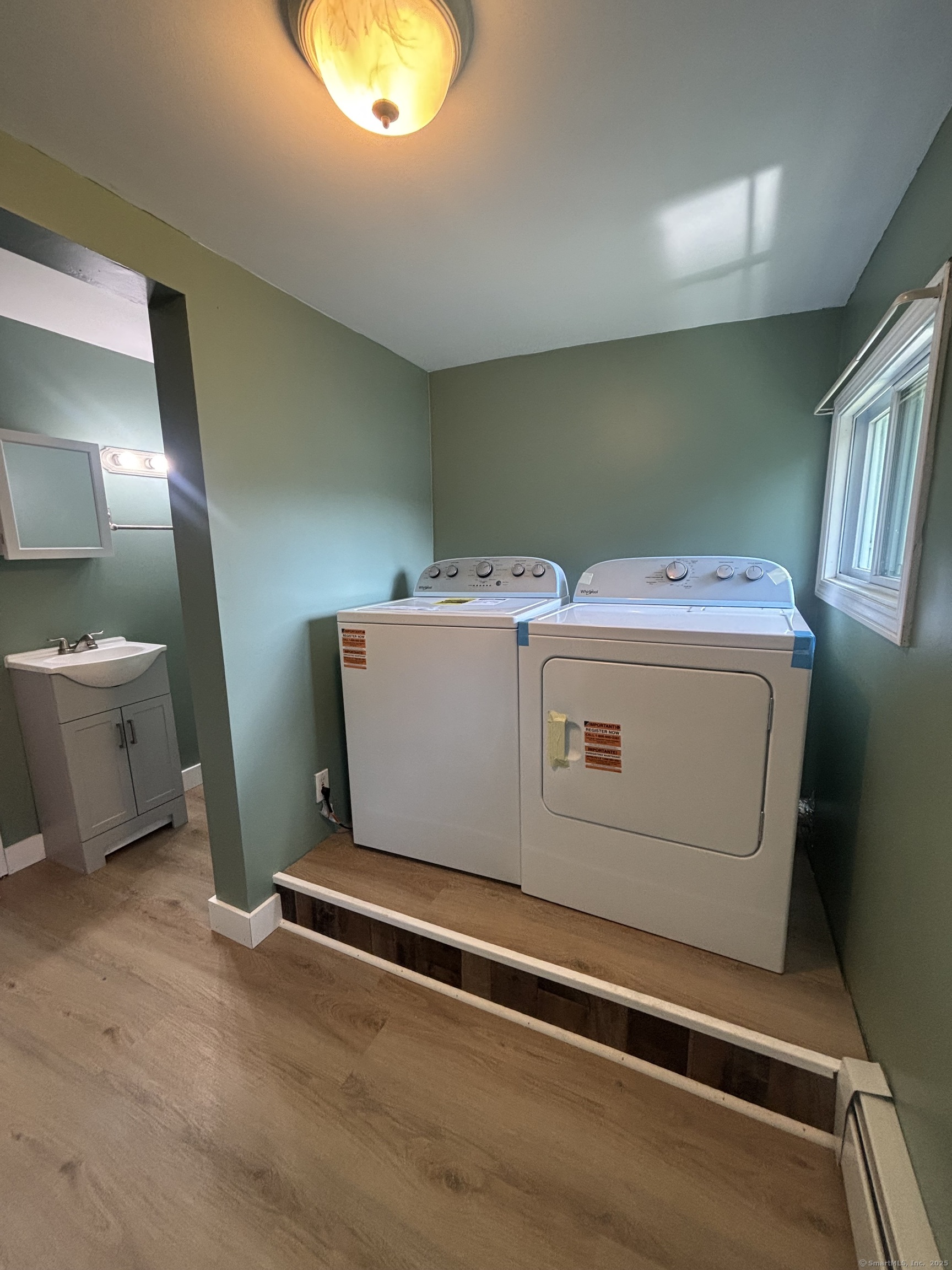 161 Cliff Street Norwich, CT 06360 - Photo 8 of 14 a room with storage and utility