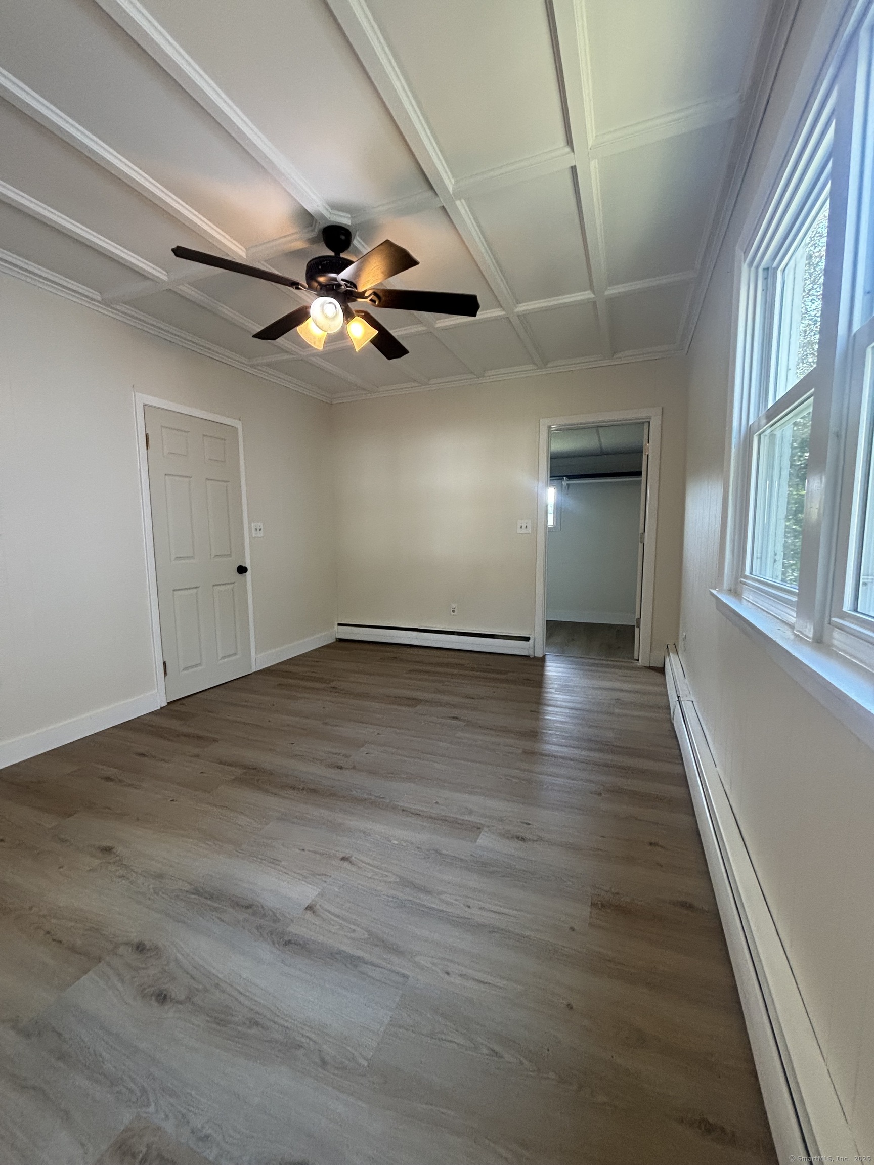 161 Cliff Street Norwich, CT 06360 - Photo 10 of 14 wooden floor in an empty room with a window