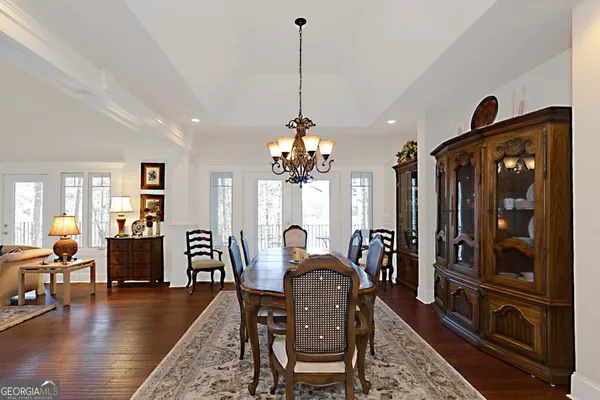 a kitchen with sink refrigerator and window