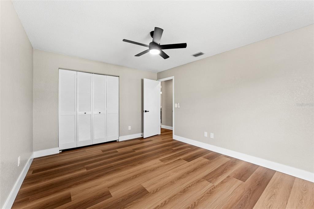 117 Poinciana Road Edgewater, FL 32141 - Photo 24 of 36 a view of empty room with wooden floor