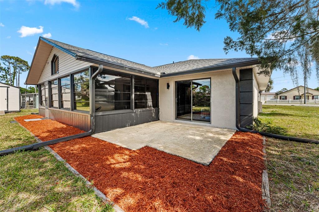 117 Poinciana Road Edgewater, FL 32141 - Photo 36 of 36 a view of a house with a outdoor space