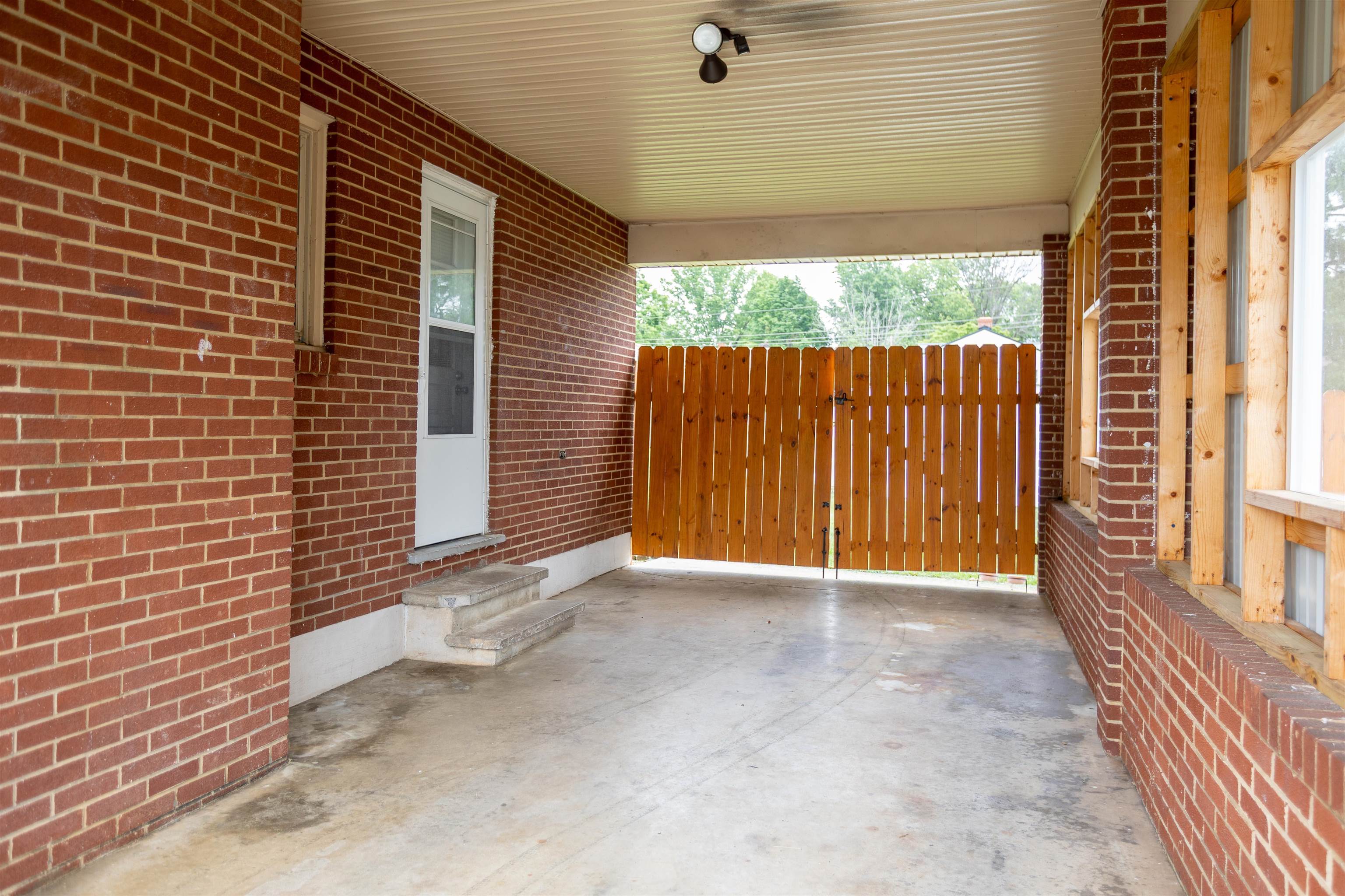 211 George Street Staunton, VA 24401 - Photo 28 of 37 a view of backyard with a door
