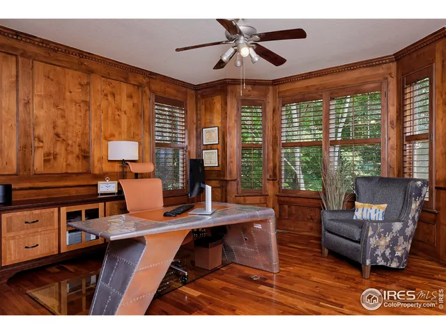 a workspace with furniture and window