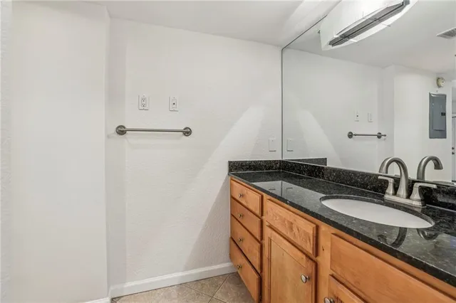 a view of balcony with furniture