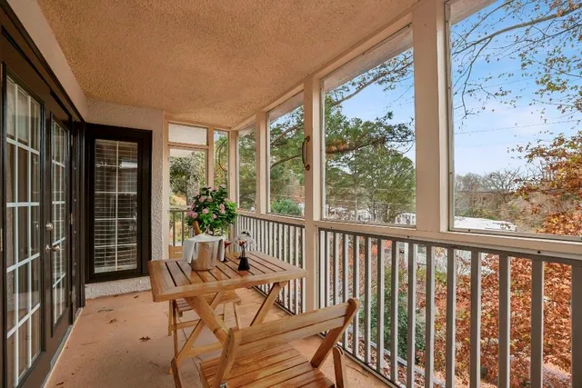 a view of a large window with wooden floor