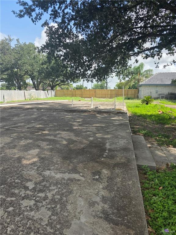 2210 West Monte Cristo Road Edinburg, TX 78541 - Photo 11 of 11 a view of yard with swimming pool and green space
