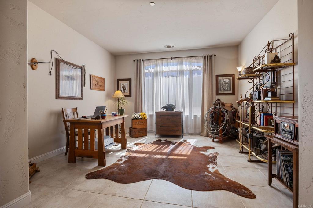 10204 Mt Olympus Valley Road Fallbrook, CA 92028 - Photo 12 of 59 a workspace with furniture and a window