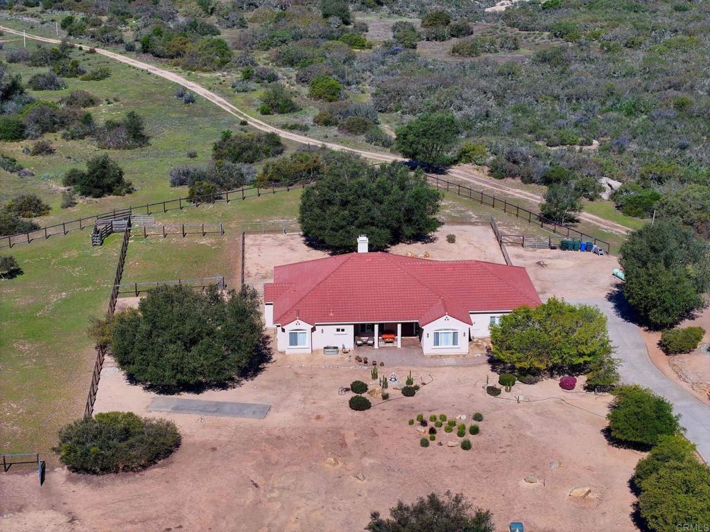 10204 Mt Olympus Valley Road Fallbrook, CA 92028 - Photo 2 of 59 an aerial view of house with yard