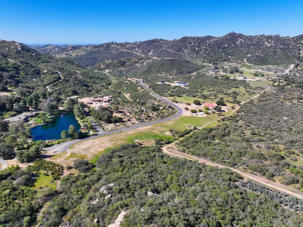 10204 Mt Olympus Valley Road Fallbrook, CA 92028 - Photo 42 of 59 a view of a city with mountains in the background
