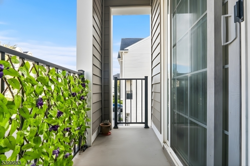 159 George Russell Way Clifton, NJ 07013 - Photo 13 of 25 a view of a back yard from a corridor