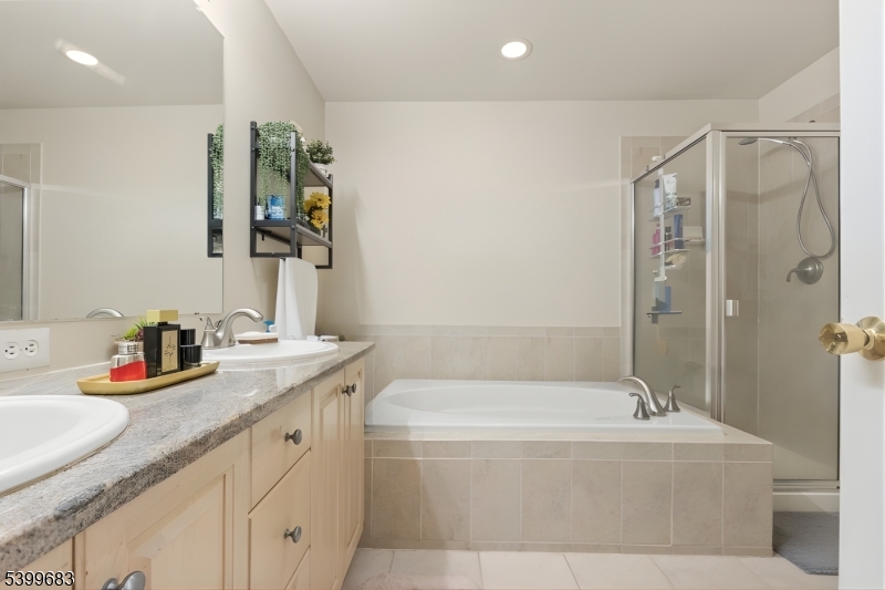 159 George Russell Way Clifton, NJ 07013 - Photo 18 of 25 a bathroom with a granite countertop sink and a mirror