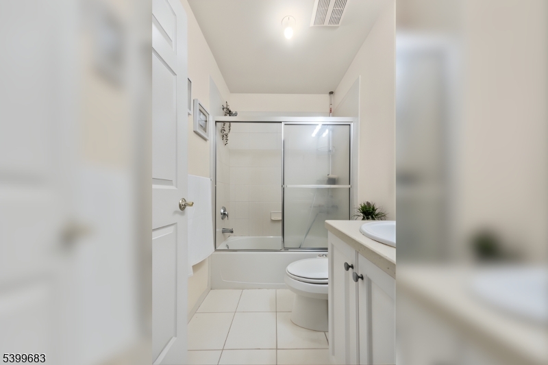 159 George Russell Way Clifton, NJ 07013 - Photo 21 of 25 a bathroom with a toilet a sink and bathtub