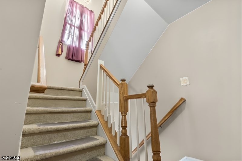 159 George Russell Way Clifton, NJ 07013 - Photo 22 of 25 a view of staircase with railing and stairs