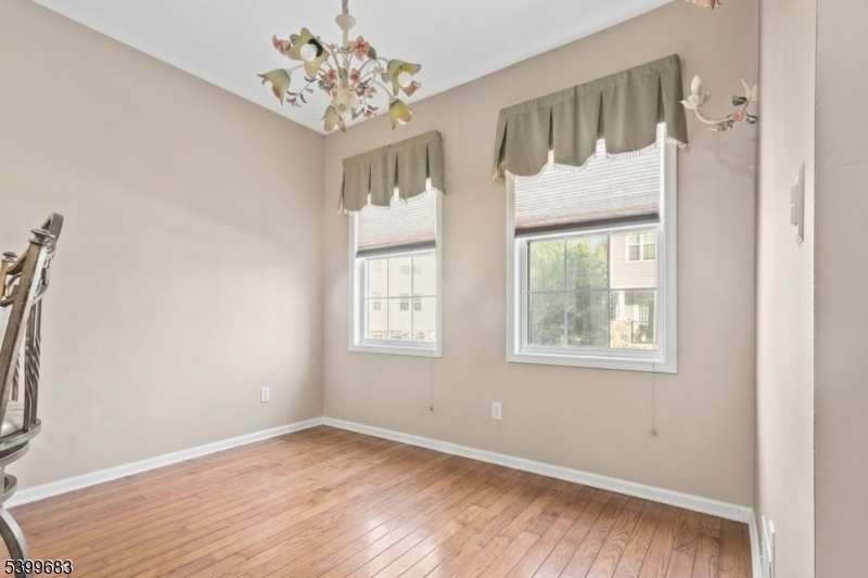 159 George Russell Way Clifton, NJ 07013 - Photo 9 of 25 a view of an empty room with a window
