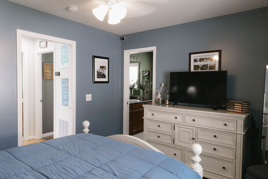 1230 Melton Road, Unit 87 West Union, SC 29696 - Photo 11 of 43 This spacious bedroom offers a tranquil retreat with convenient access to an adjacent bathroom.