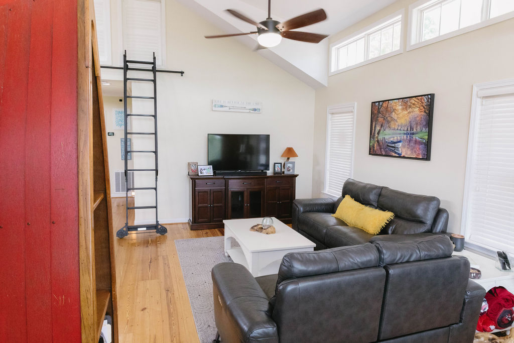 1230 Melton Road, Unit 87 West Union, SC 29696 - Photo 13 of 43 This bright living area features vaulted ceilings and ample natural light, creating an inviting atmosphere.