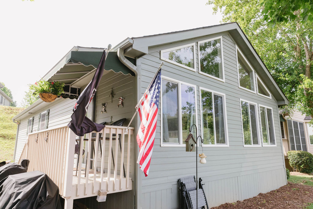 1230 Melton Road, Unit 87 West Union, SC 29696 - Photo 2 of 43 This house features a charming outdoor living space, perfect for relaxing and enjoying the surroundings.