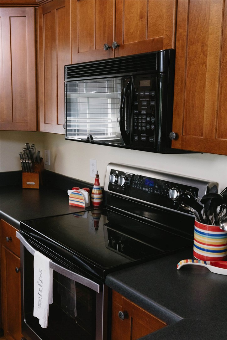 1230 Melton Road, Unit 87 West Union, SC 29696 - Photo 25 of 43 This kitchen showcases ample cabinet storage and modern appliances.