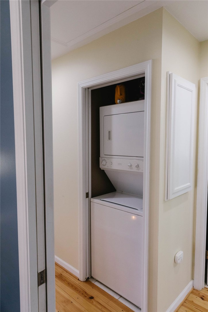 1230 Melton Road, Unit 87 West Union, SC 29696 - Photo 28 of 43 This dedicated laundry area features convenient stacked appliances, enhancing daily routines.