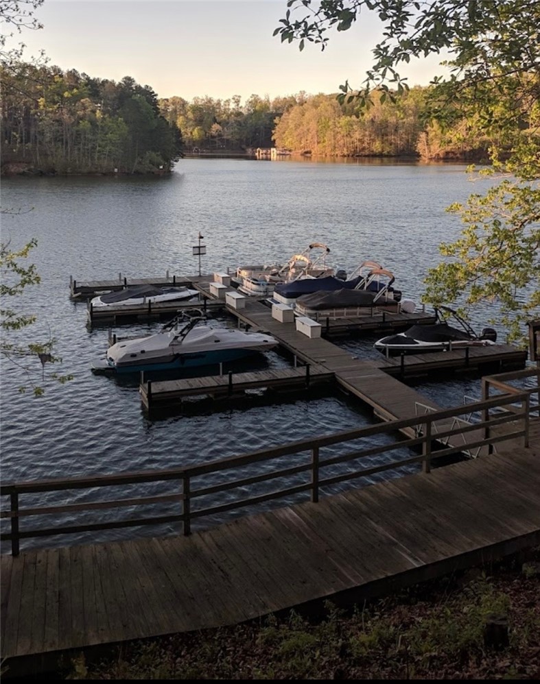 1230 Melton Road, Unit 87 West Union, SC 29696 - Photo 41 of 43 This tranquil waterfront retreat offers private boat slips and serene lake views, perfect for outdoor enthusiasts.