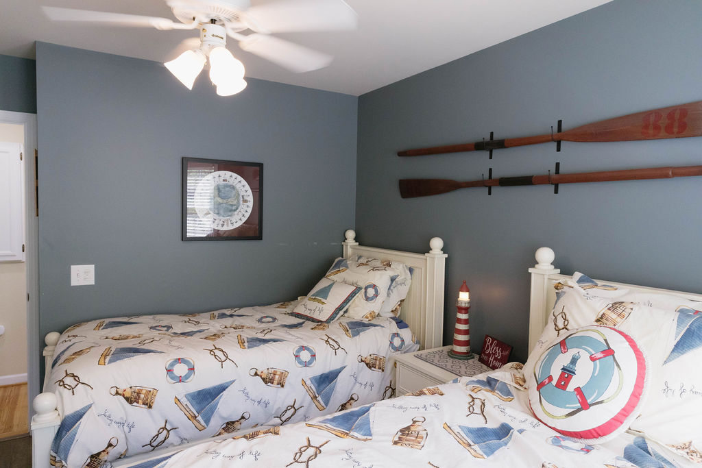 1230 Melton Road, Unit 87 West Union, SC 29696 - Photo 7 of 43 This inviting bedroom features nautical decor, offering comfort and style.
