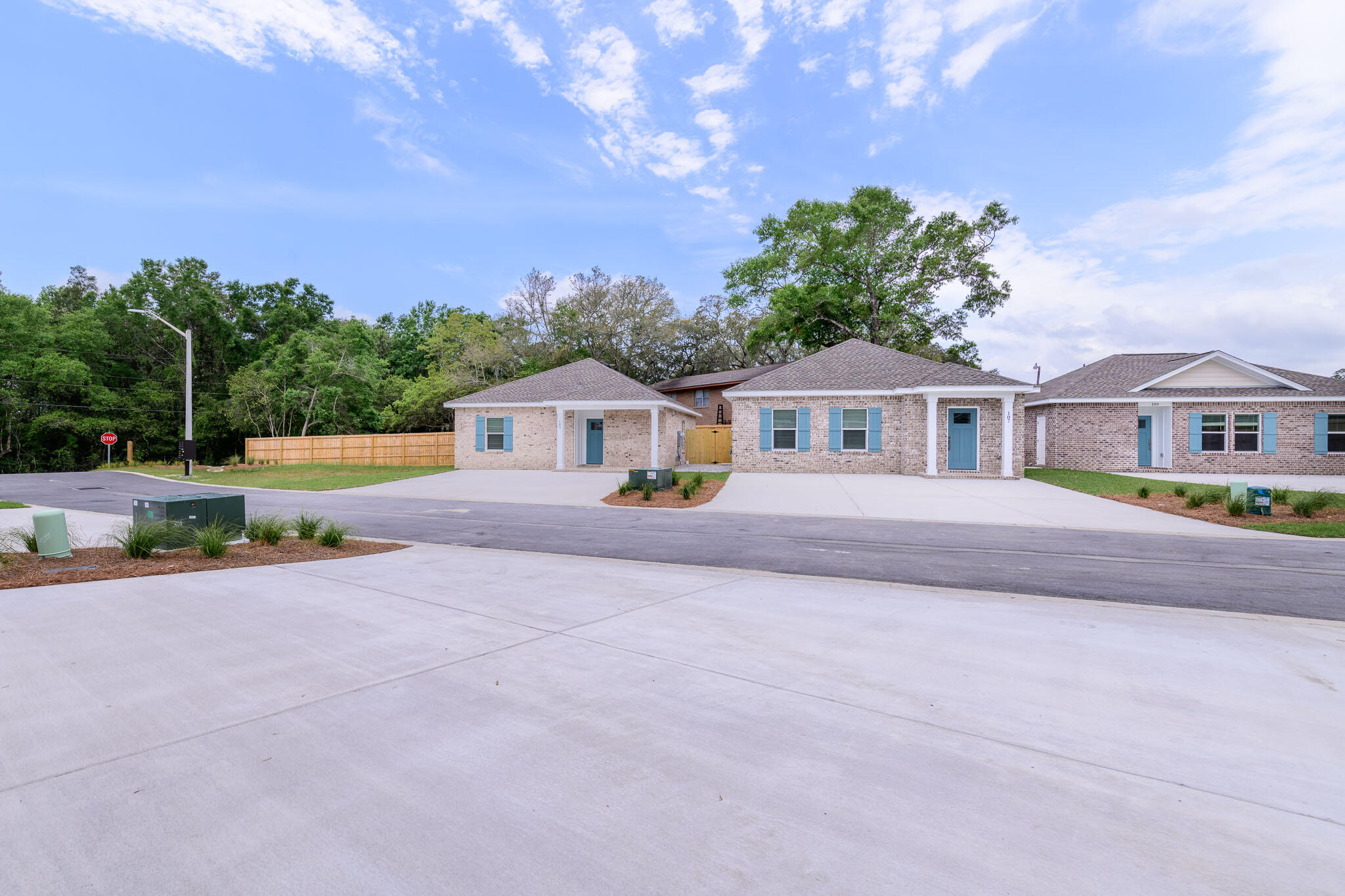 107 Clearing Way Valparaiso, FL 32580 - Photo 22 of 22 a front view of house with yard and trees in the background