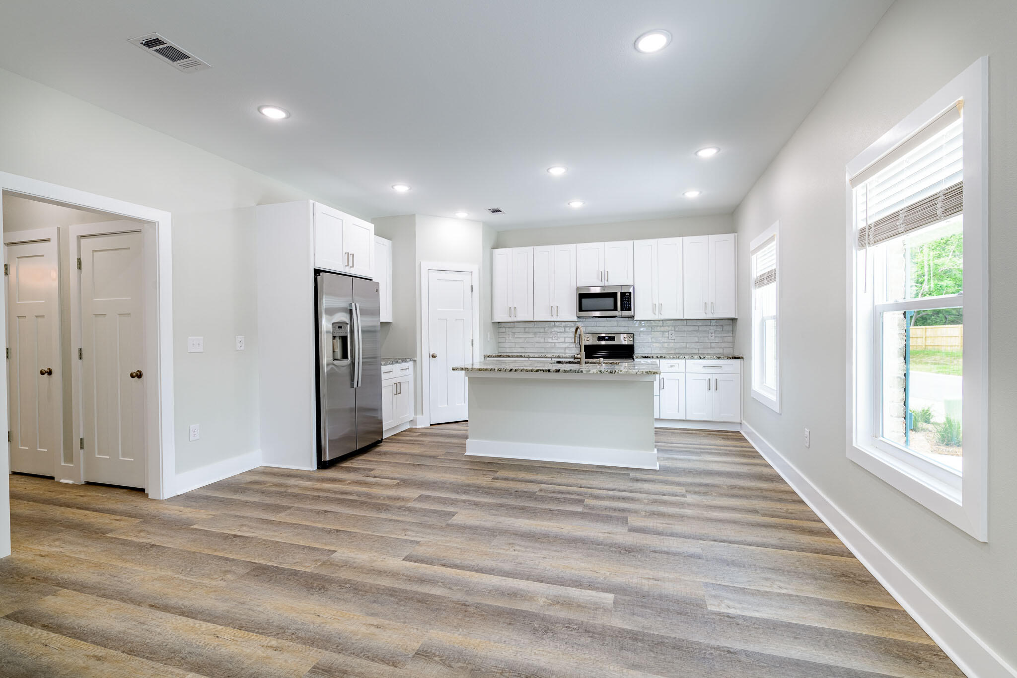107 Clearing Way Valparaiso, FL 32580 - Photo 3 of 22 a view of kitchen view wooden cabinets and stainless steel appliances