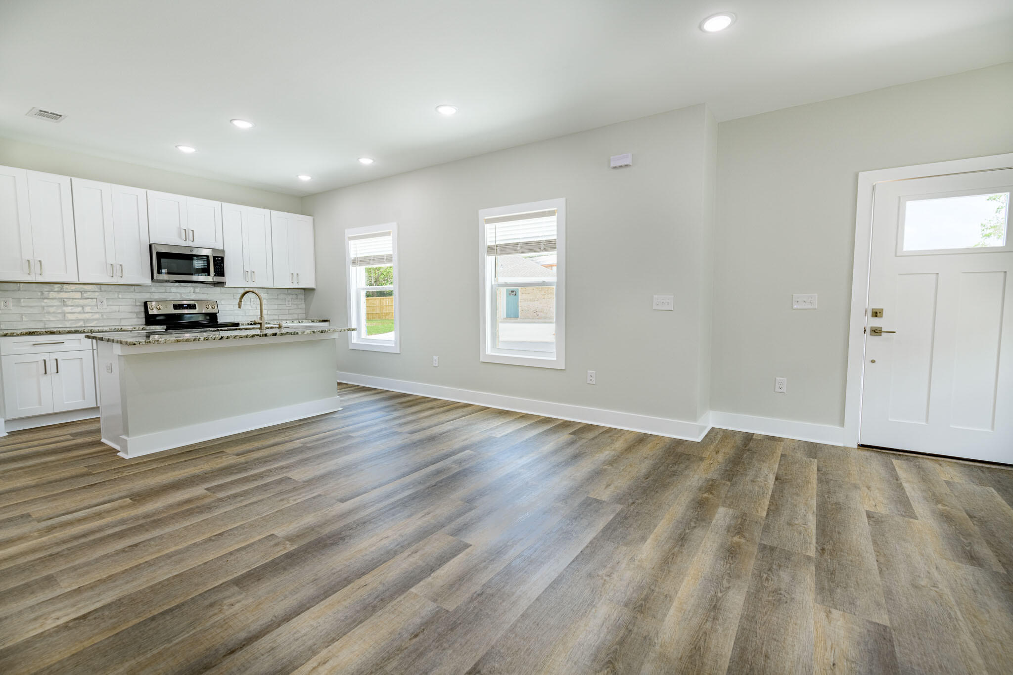 107 Clearing Way Valparaiso, FL 32580 - Photo 10 of 22 a view of kitchen and microwave
