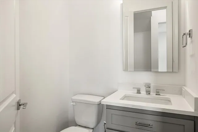 a bathroom with a sink and a toilet