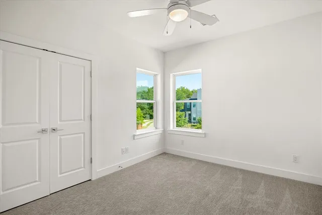 an empty room with windows