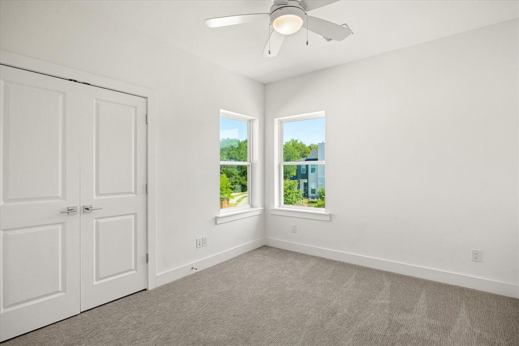 2125 Bird Street Fort Worth, TX 76111 - Photo 22 of 34 an empty room with windows
