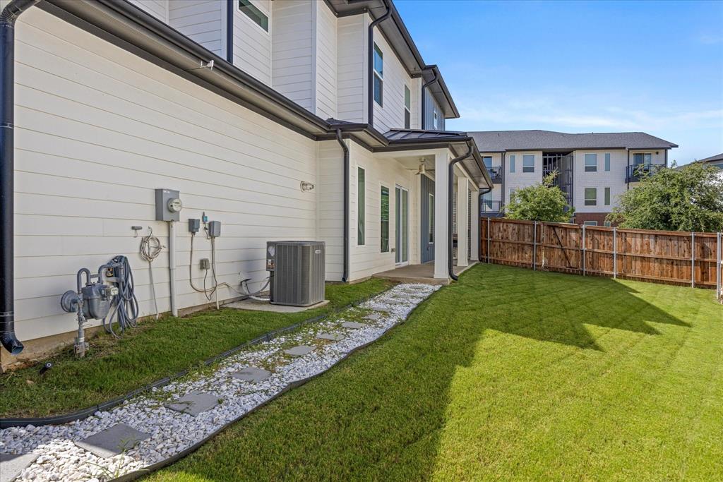 2125 Bird Street Fort Worth, TX 76111 - Photo 25 of 34 a front view of a house with garden