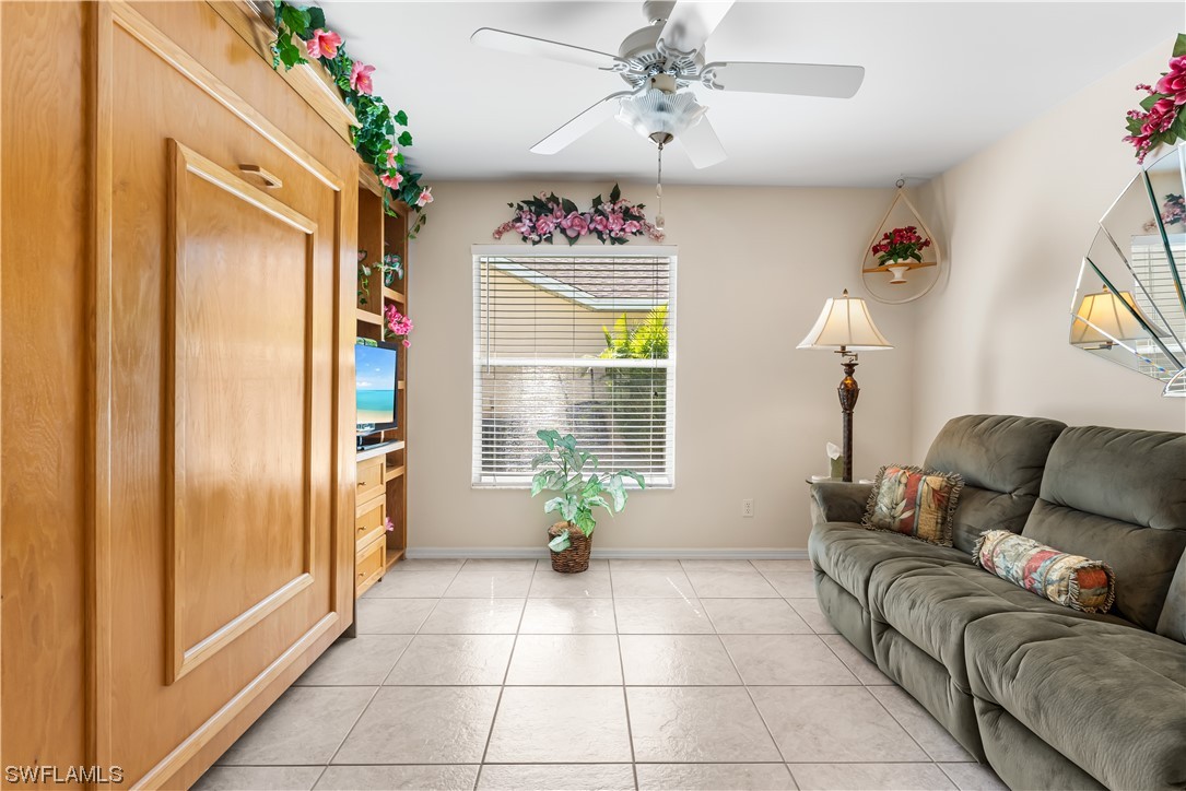 17536 Plumera Lane North Fort Myers, FL 33917 - Photo 24 of 50 a living room with furniture and a potted plant