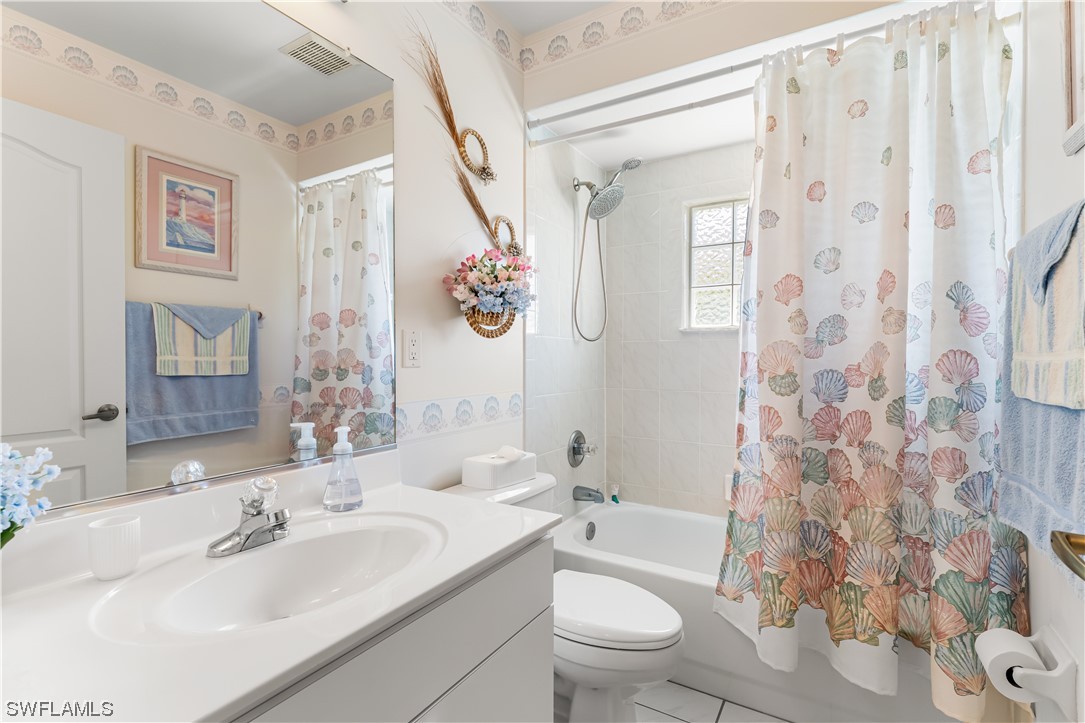 17536 Plumera Lane North Fort Myers, FL 33917 - Photo 29 of 50 a bathroom with a sink toilet and shower